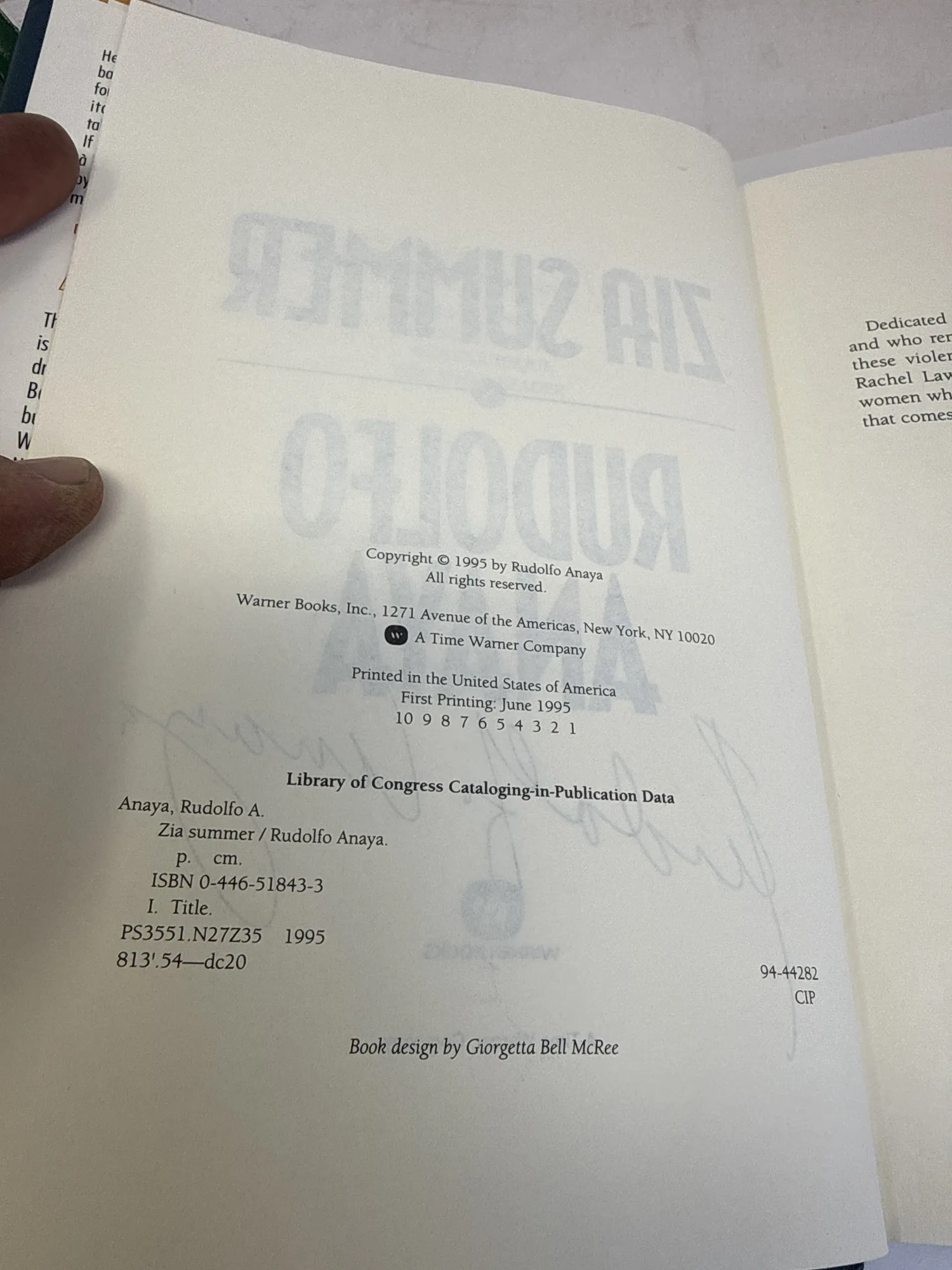 Copyright page of Zia Summer by Rudolfo Anaya, Warner Books 1995, showing First Printing June 1995, complete number line 10 9 8 7 6 5 4 3 2 1, ISBN 0-446-51843-3, and book design credit to Giorgetta Bell McRee. Photographed at the New Mexico Literacy Project sorting desk in Albuquerque.