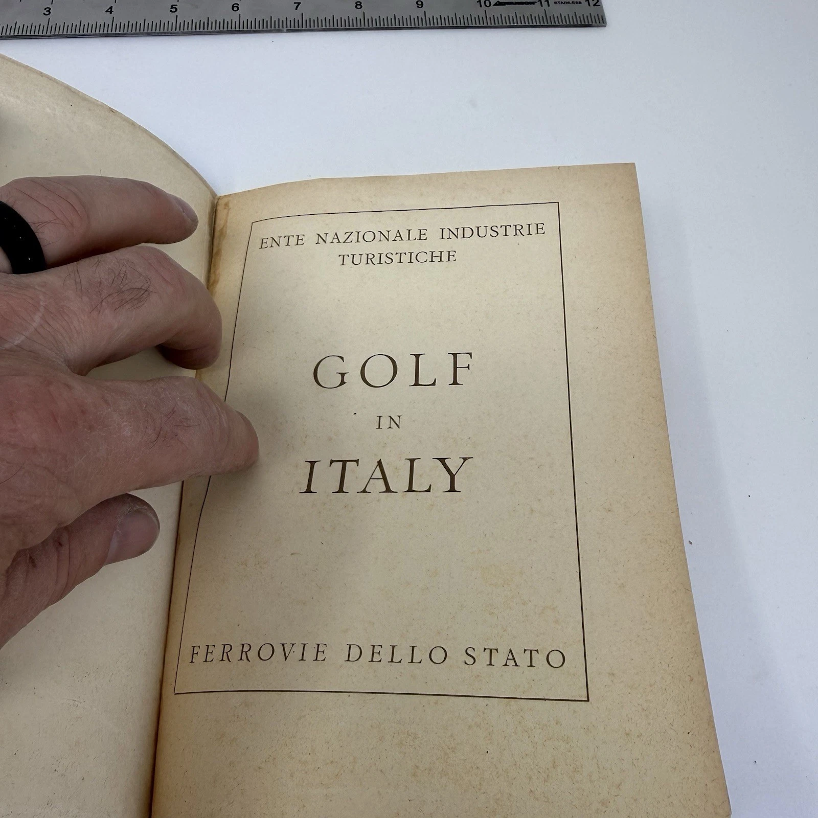 Title page reading 'ENTE NAZIONALE INDUSTRIE TURISTICHE / GOLF IN ITALY / FERROVIE DELLO STATO'