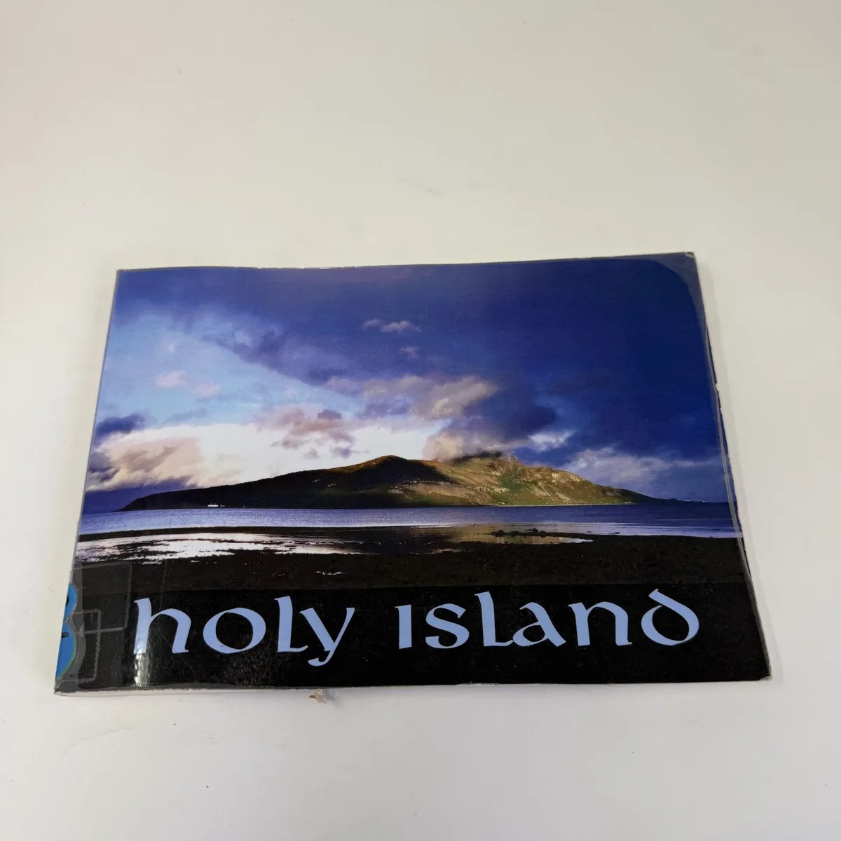Cover of Holy Island booklet by Yeshe Losal Rinpoche, Kagyu Samye Ling Monastery 2007, with photographic landscape of the Scottish island