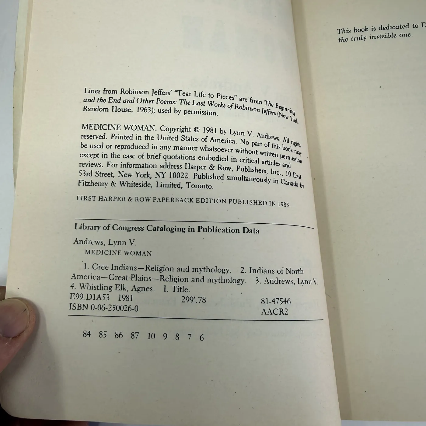 The copyright page of the 1983 Harper & Row paperback of Medicine Woman. The page is set in tight monospace-adjacent type. At top, a credit line acknowledges the use of lines from Robinson Jeffers' poem 'Tear Life to Pieces' (from The Beginning and the End and Other Poems: The Last Works of Robinson Jeffers, Random House 1963). The next block reads: 'MEDICINE WOMAN. Copyright 1981 by Lynn V. Andrews. All rights reserved. Printed in the United States of America. No part of this book may be used or reproduced in any manner whatsoever without written permission except in the case of brief quotations embodied in critical articles and reviews. For information address Harper & Row, Publishers, Inc., 10 East 53rd Street, New York, NY 10022. Published simultaneously in Canada by Fitzhenry & Whiteside, Limited, Toronto.' Below in a centered line: 'FIRST HARPER & ROW PAPERBACK EDITION PUBLISHED IN 1983.' Then in a clearly demarcated boxed block: 'Library of Congress Cataloging in Publication Data / Andrews, Lynn V. / MEDICINE WOMAN / 1. Cree Indians—Religion and mythology. 2. Indians of North America—Great Plains—Religion and mythology. 3. Andrews, Lynn V. 4. Whistling Elk, Agnes. I. Title. / E99.D1A53 1981  299'.78  81-47546 / ISBN 0-06-250026-0  AACR2'. At the bottom: '84 85 86 87 10 9 8 7 6'.