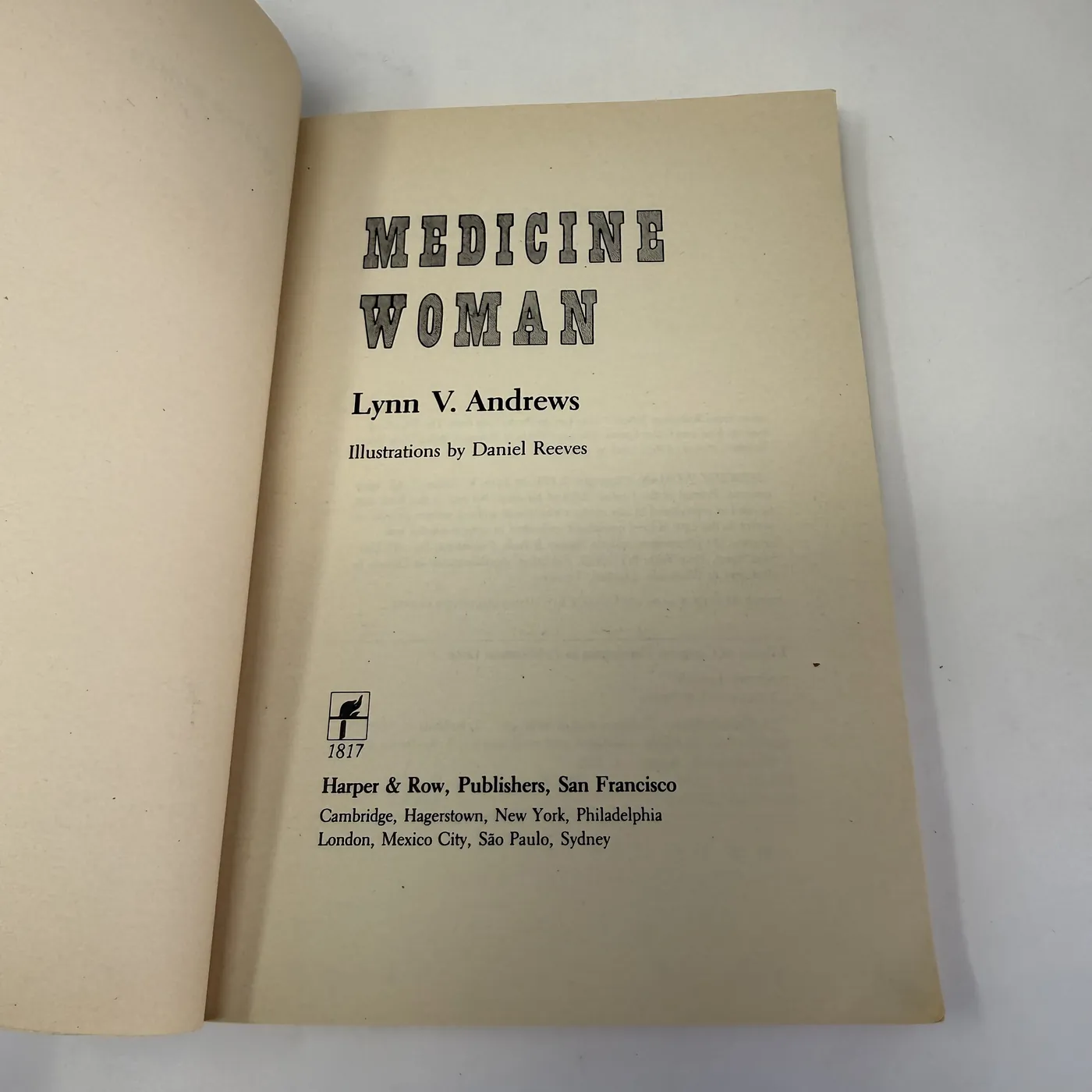The title page of the Harper & Row paperback edition of Medicine Woman, showing the title 'MEDICINE WOMAN' in an Old West Tombstone-style serif display face across the top, 'Lynn V. Andrews' in italic script below, 'Illustrations by Daniel Reeves' in smaller text under the author line, and at bottom the Harper & Row publisher logo (a small ship icon labeled 1817) followed by 'Harper & Row, Publishers, San Francisco / Cambridge, Hagerstown, New York, Philadelphia / London, Mexico City, São Paulo, Sydney'.