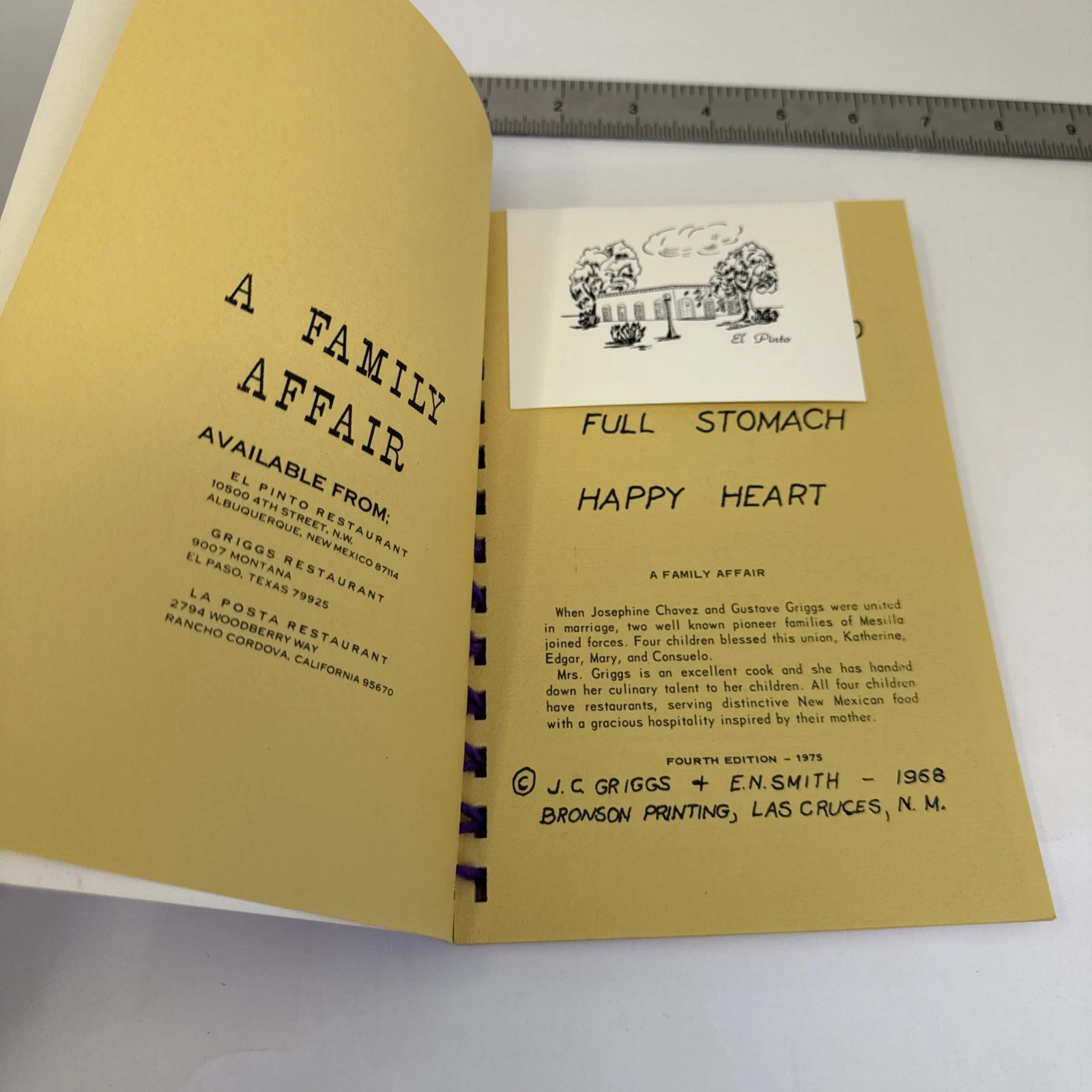 The colophon page reading 'Full Stomach Happy Heart — A Family Affair' with the Mesilla pioneer family origin story, four children's names, and three restaurant distribution points including El Pinto Restaurant Albuquerque, Griggs Restaurant El Paso, and La Posta Restaurant Rancho Cordova California, with a watercolor illustration of an adobe house