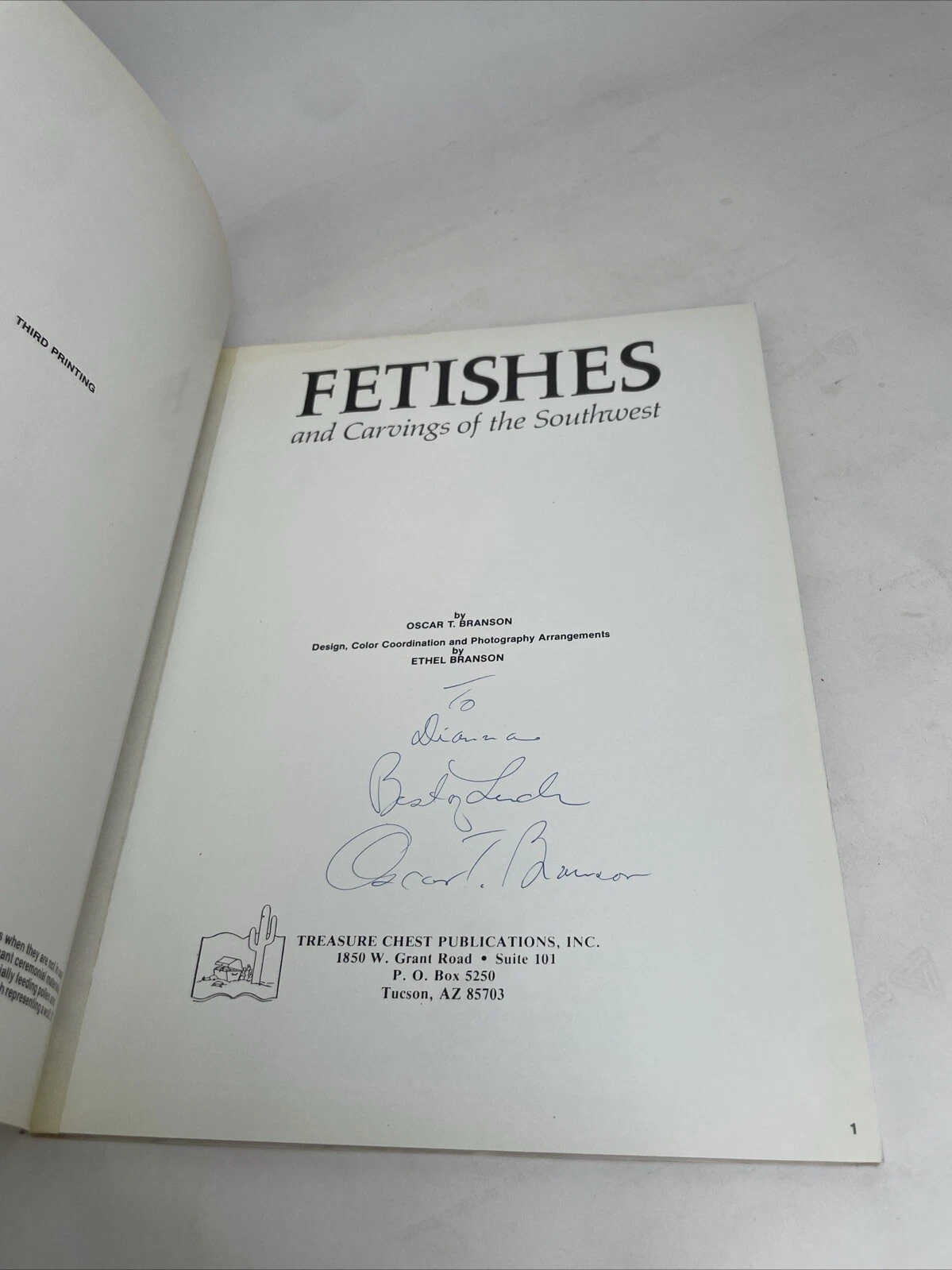 The title page reading 'FETISHES and Carvings of the Southwest by Oscar T. Branson' with inscription 'To Diana Best of Luck Oscar T. Branson'