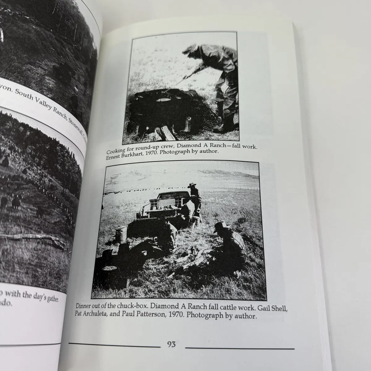 Two interior photographs from Diamond A Ranch fall cattle work in 1970: top photograph captioned 'Cooking for round-up crew, Diamond A Ranch — fall work, Ernest Burkhart, 1970, Photograph by author', bottom photograph captioned 'Dinner out of the chuck-box. Diamond A Ranch fall cattle work. Gail Shell, Pat Archuleta, and Paul Patterson, 1970. Photograph by author.'