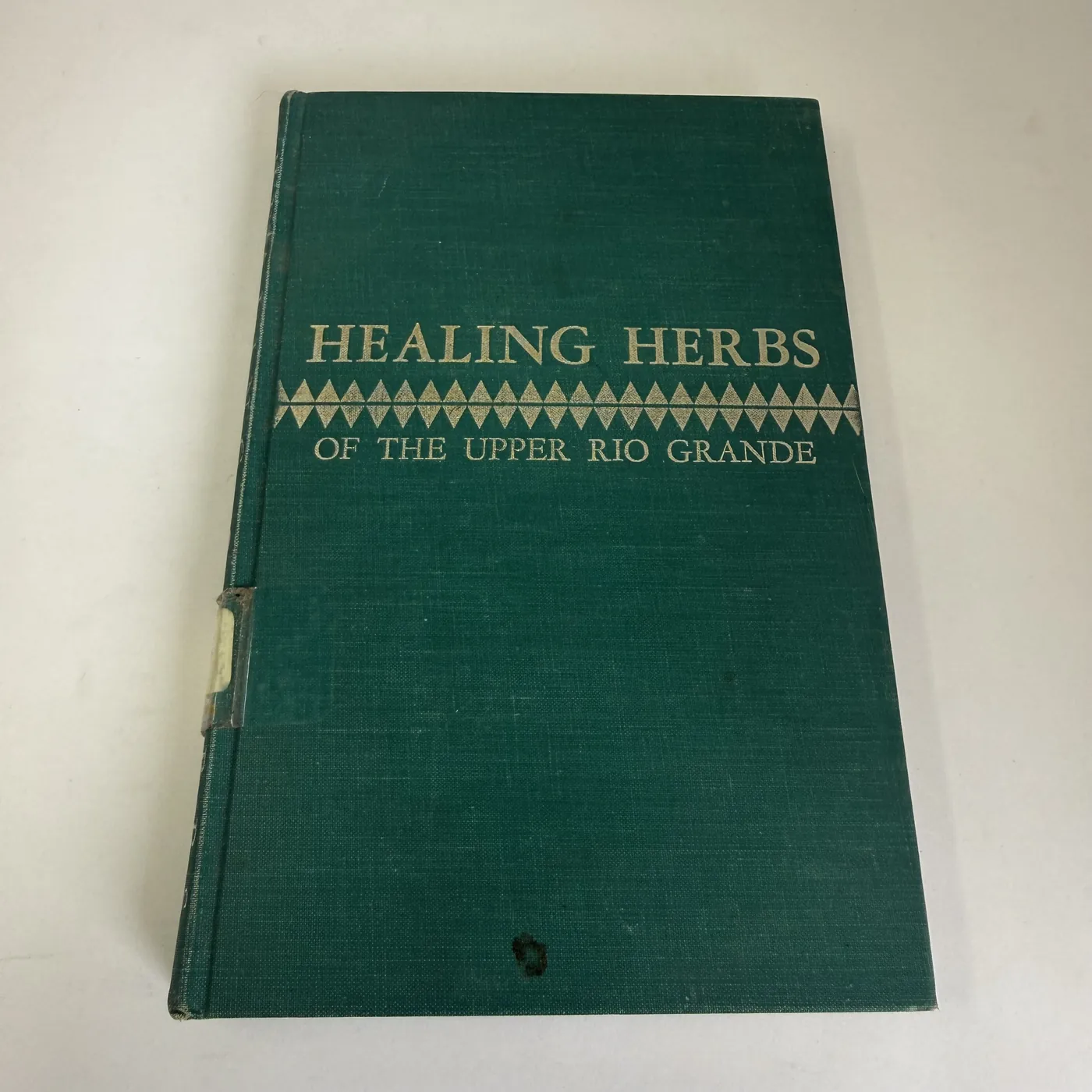 Green book-cloth front cover of L. S. M. Curtin Healing Herbs of the Upper Rio Grande Southwest Museum 1965 Second Printing 1974 Albuquerque Public Library Title VII discard