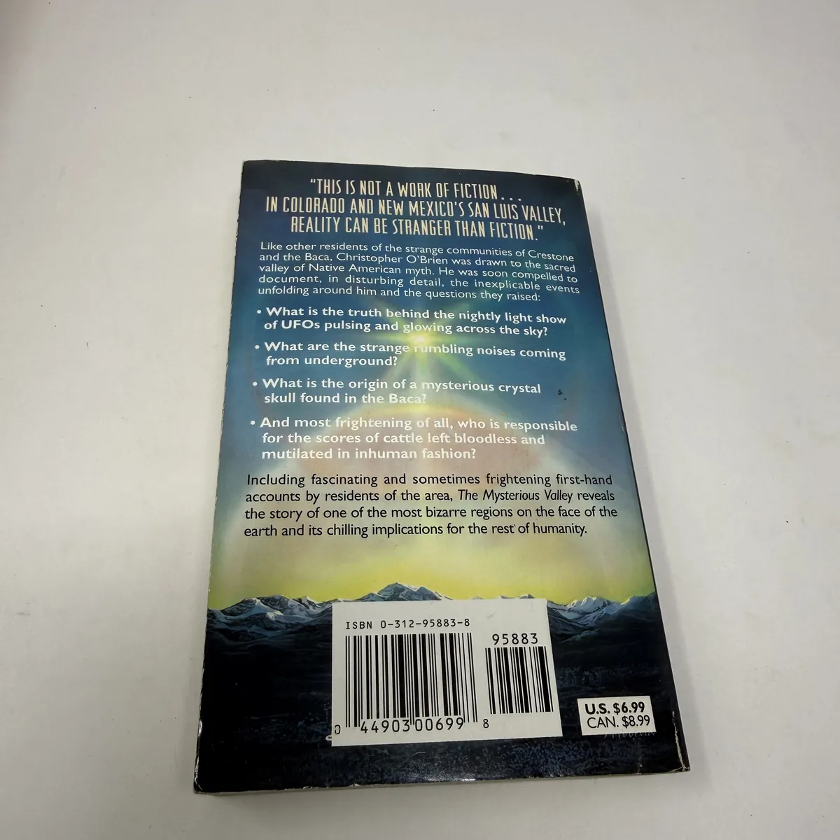 Back cover summary describing Crestone, the Baca, and Christopher O'Brien's investigation of the San Luis Valley anomalies