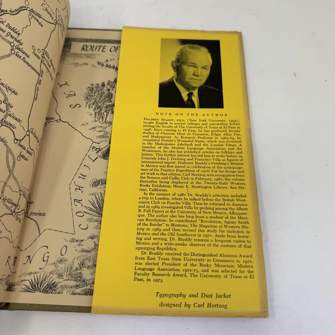 The yellow rear dust-jacket flap of Pershing's Mission in Mexico with a black and white head-and-shoulders portrait photograph of Haldeen Braddy at top and a multi-paragraph 'Note on the Author' biography below detailing his UTEP career, his Chaucer/Poe/Shakespeare scholarship, his Pancho Villa research, and the Carl Hertzog typography and dust-jacket credit at the bottom.