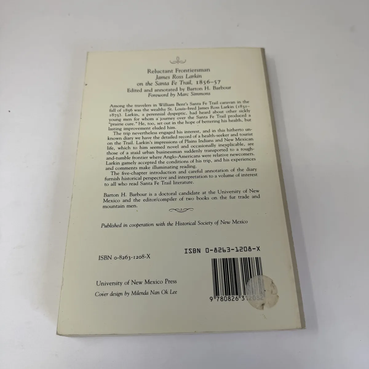 Back cover of Reluctant Frontiersman with publisher's blurb summarizing Larkin's St. Louis background, his prairie-cure motivation for the trip, and Barton H. Barbour's editorial work, with the Historical Society of New Mexico cooperative imprint