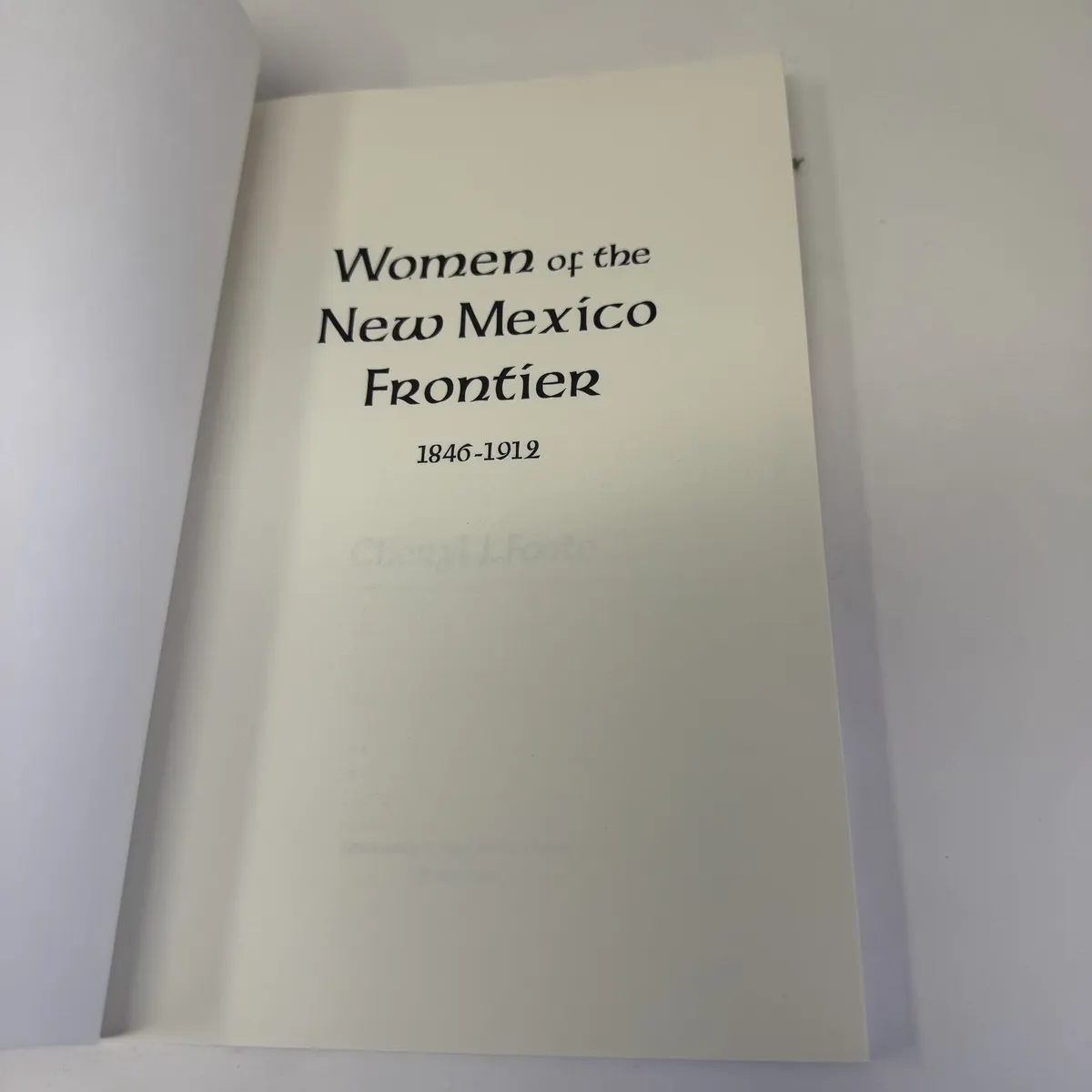 Title page reading Women of the New Mexico Frontier 1846-1912 by Cheryl J. Foote