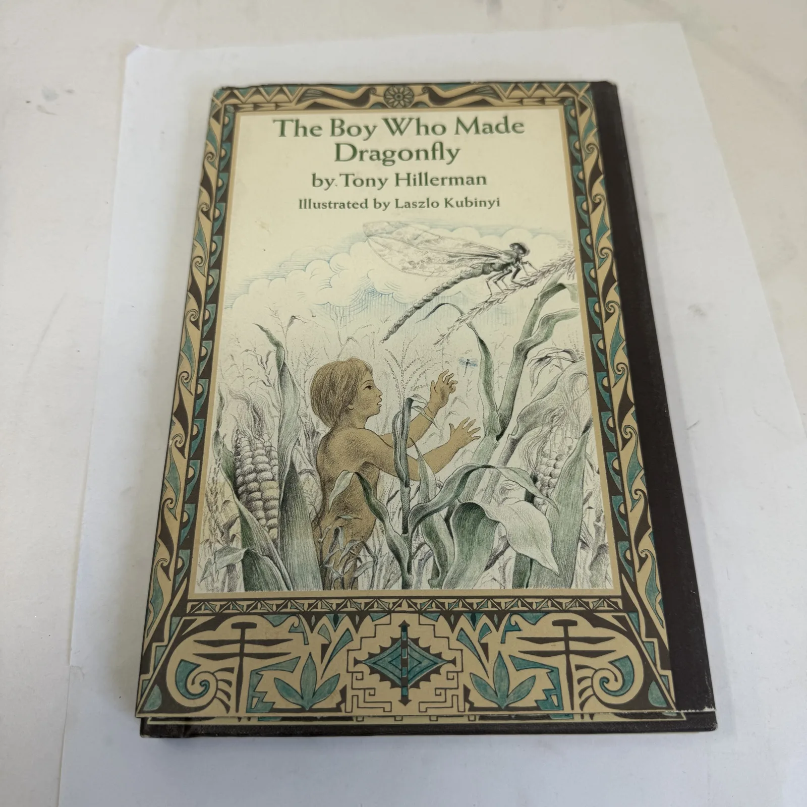 Pictorial cover of The Boy Who Made Dragonfly A Zuni Myth by Tony Hillerman illustrated by Laszlo Kubinyi, 1972 Harpercrest library binding issue, photographed at New Mexico Literacy Project