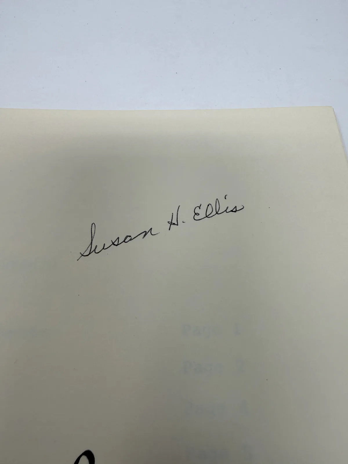Susan H. Ellis ink signature on the free endpaper of her book New Mexico Colcha Embroidery, photographed at New Mexico Literacy Project