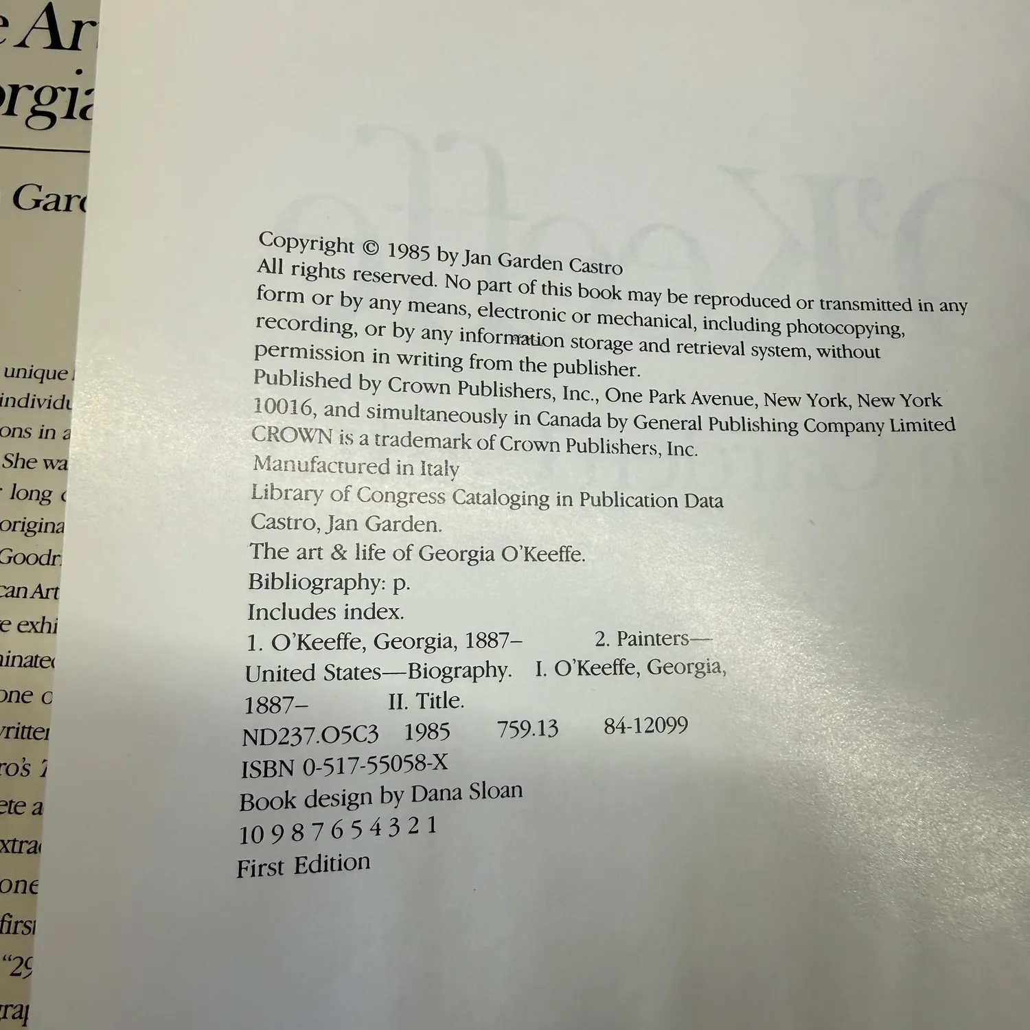Copyright page of The Art and Life of Georgia O'Keeffe showing first printing number line 10 9 8 7 6 5 4 3 2 1 confirming first edition, ISBN 0-517-55058-X, Crown Publishers 1985