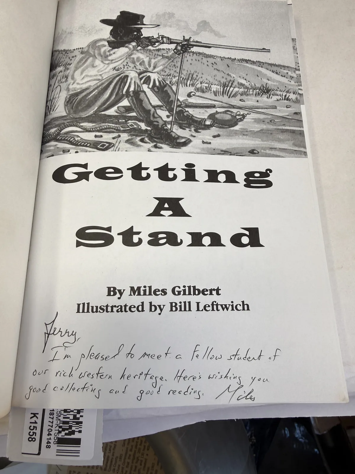 Title page of Getting A Stand inscribed in ink by author Miles Gilbert to a fellow student of western heritage, photographed at New Mexico Literacy Project