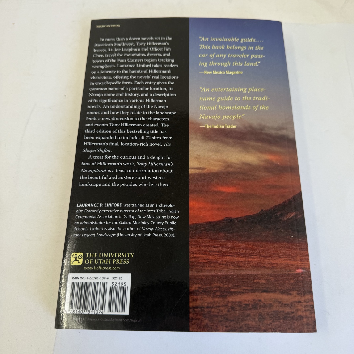 Back cover of Tony Hillerman's Navajoland by Laurance D. Linford showing author biography, New Mexico Magazine and Indian Trader review blurbs, University of Utah Press publisher information, ISBN 978-1-60781-137-4 barcode, and $21.95 cover price