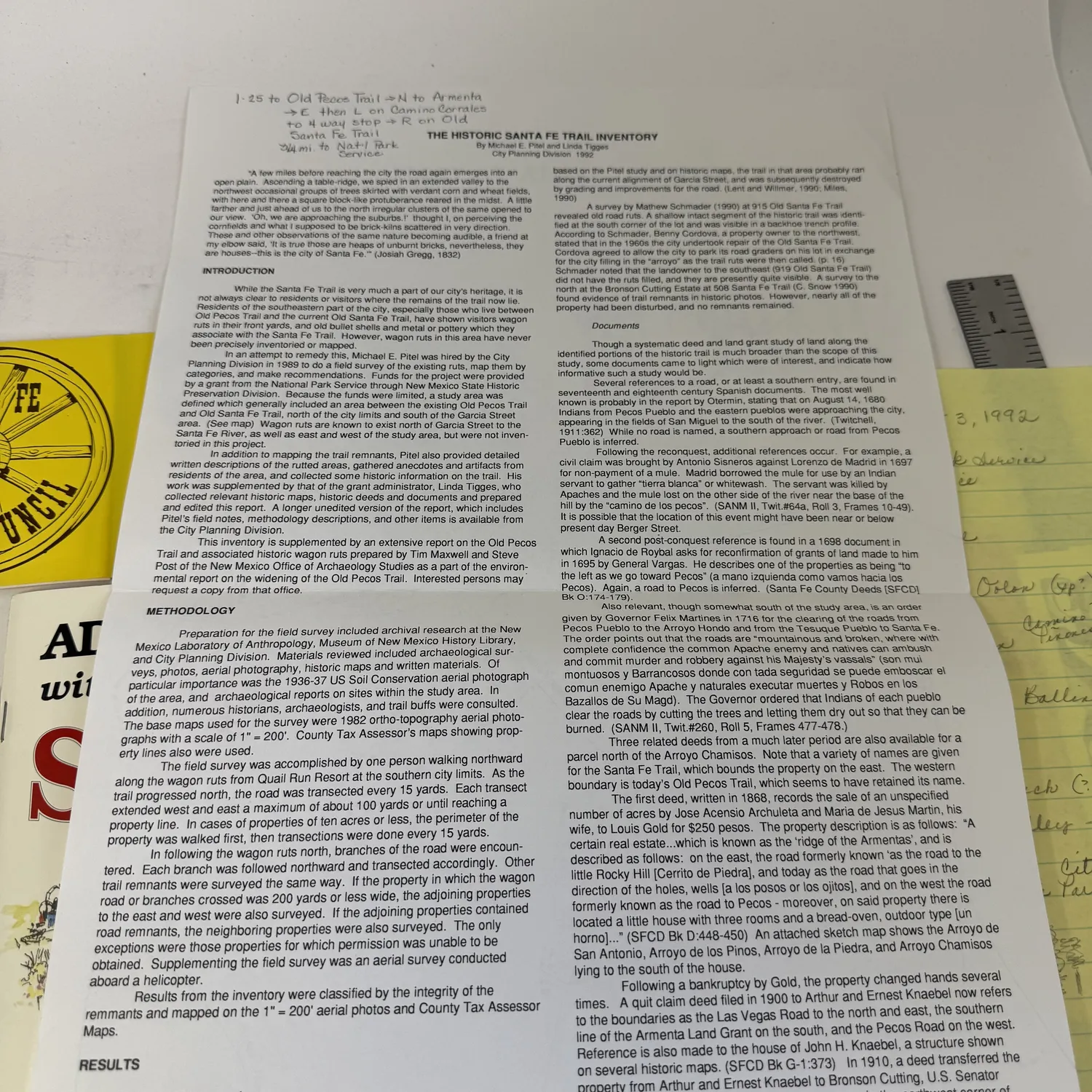 The Historic Santa Fe Trail Inventory — typed academic research document describing field survey methodology for wagon rut mapping using 1936-37 USDA SCS aerial photography, County Tax Assessor maps, and NM Office of Archaeology Studies references. Discusses the Old Pecos Trail, Arroyo de los Pinos, Pecos River crossings, Armenta Land Grant documentation, and property history from the Bronson Cutting estate. Primary source from an Albuquerque estate donation to the New Mexico Literacy Project.