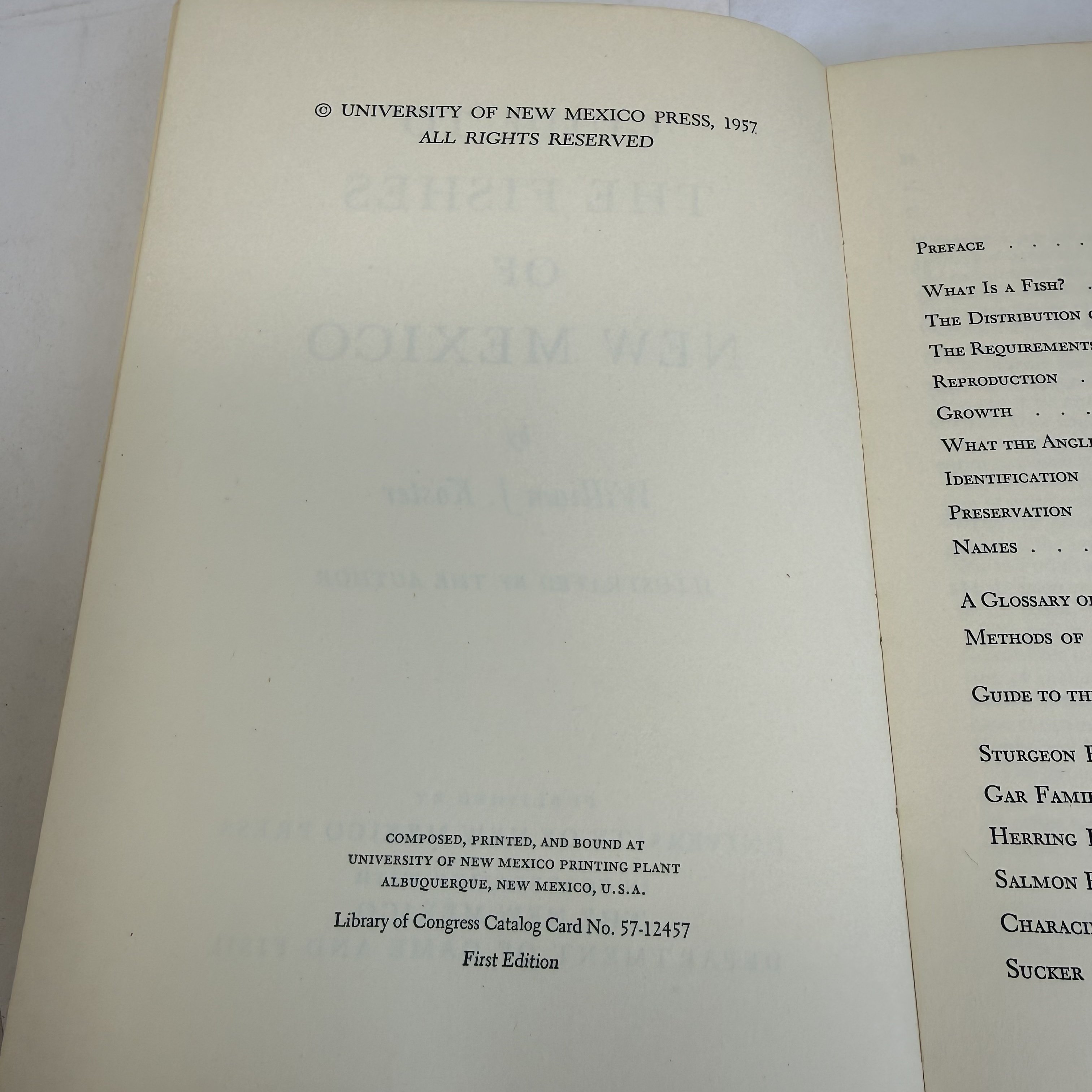 Copyright page and table of contents spread of Guide to the Fishes of New Mexico, 1957 first edition. First Edition stated. Library of Congress Catalog Card No. 57-12457. Composed, printed, and bound at University of New Mexico Printing Plant, Albuquerque. TOC includes Preface, What Is a Fish, Distribution, Requirements, Reproduction, Growth, Identification, Glossary, and Guide to the Fishes by family — Sturgeon, Gar, Herring, Salmon, Characin, Sucker, and more.