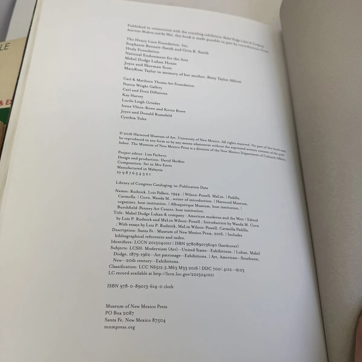 Copyright page of Mabel Dodge Luhan and Company showing first printing number line 10 9 8 7 6 5 4 3 2 1, ISBN 978-0-89013-614-0, Library of Congress data, Museum of New Mexico Press 2016 — photographed by Josh Eldred