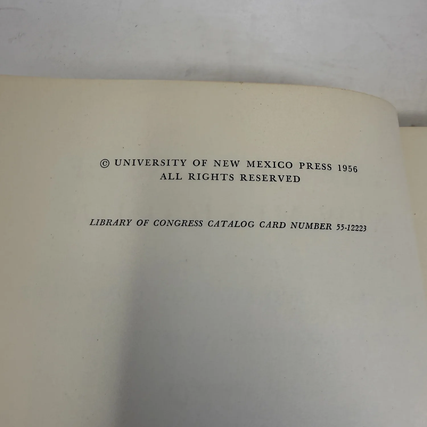 Copyright page of the 1956 first edition of The Missions of New Mexico, 1776 with the University of New Mexico Press copyright and Library of Congress Catalog Card Number 55-12223, photographed at New Mexico Literacy Project