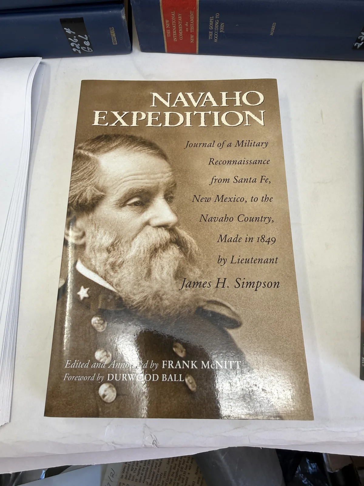 Dust jacket of Navaho Expedition, journal of a military reconnaissance from Santa Fe to the Navaho country in 1849 by Lieutenant James H. Simpson, edited by Frank McNitt, with a portrait of Simpson, photographed at New Mexico Literacy Project