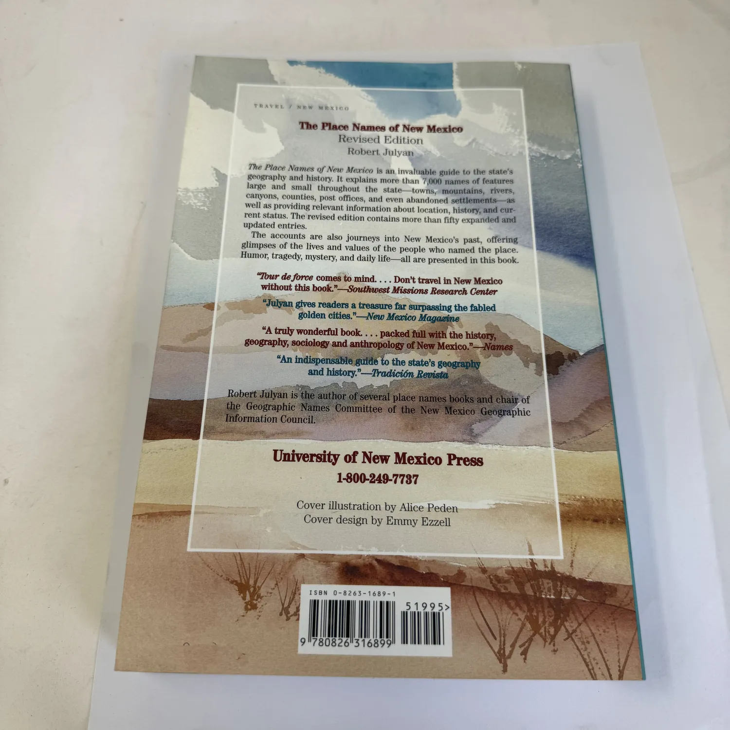Back cover of The Place Names of New Mexico, Revised Edition by Robert Julyan — description of 7,000-plus place name entries covering towns, mountains, rivers, canyons, counties, post offices, and abandoned settlements, with reviews and University of New Mexico Press imprint