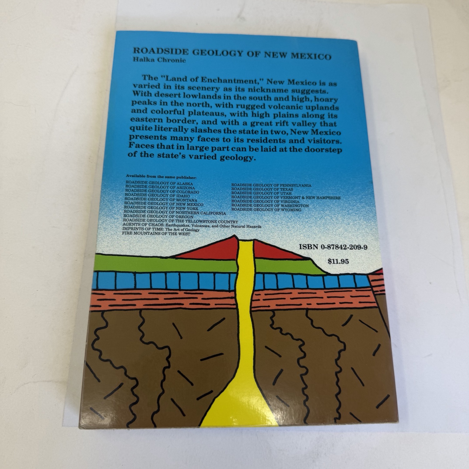 Back cover of Roadside Geology of New Mexico by Halka Chronic — geological cross-section showing rift valley, description of New Mexico's varied geology, list of other titles in the Roadside Geology Series. ISBN 0-87842-209-9, $11.95. Mountain Press Publishing Company, Missoula, Montana.