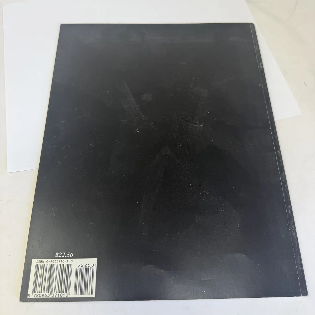The Rugs of Teec Nos Pos by Ruth K. Belikove — back cover