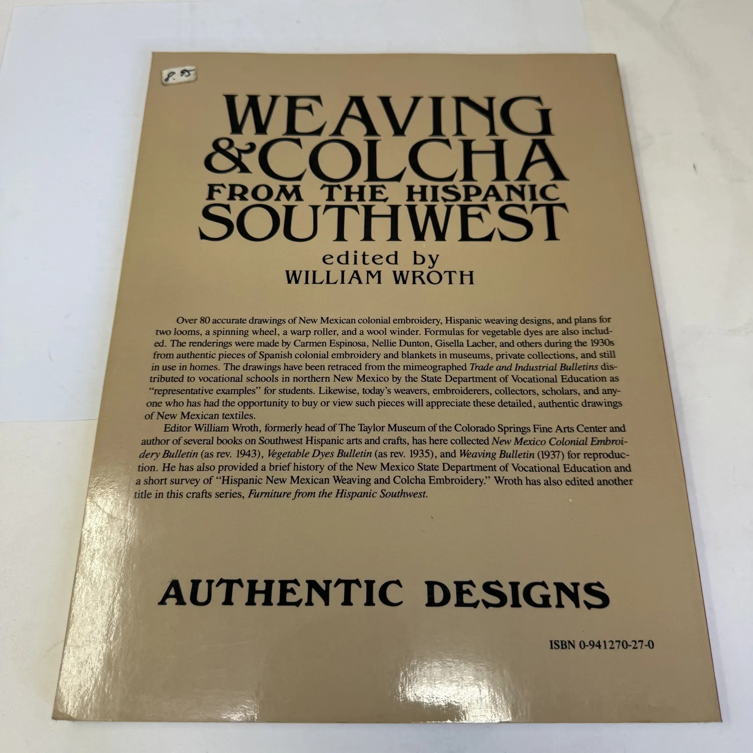 Back cover of Weaving and Colcha from the Hispanic Southwest showing full description of contents, editor biography for William Wroth of the Taylor Museum Colorado Springs Fine Arts Center, and ISBN 0-941270-27-0