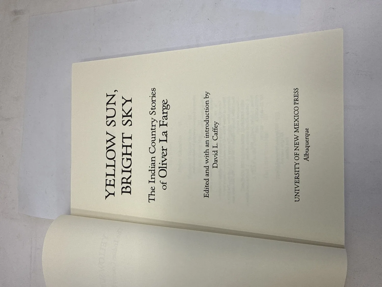 Title page of Yellow Sun, Bright Sky: The Indian Country Stories of Oliver La Farge, edited and with an introduction by David L. Caffey, University of New Mexico Press, Albuquerque. Photographed at the New Mexico Literacy Project sorting desk in Albuquerque.